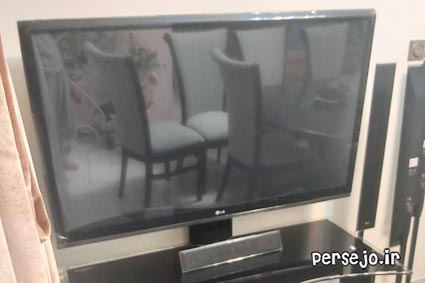 تلویزیون LCD مدل LG به همراه سینما خانواده و میز